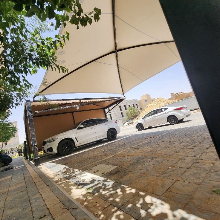 مظلات مواقف سيارات قماش كوري الرياض
