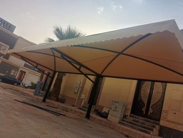 تصميم مظلات سيارات PVC حسب الطلب حي الحزم